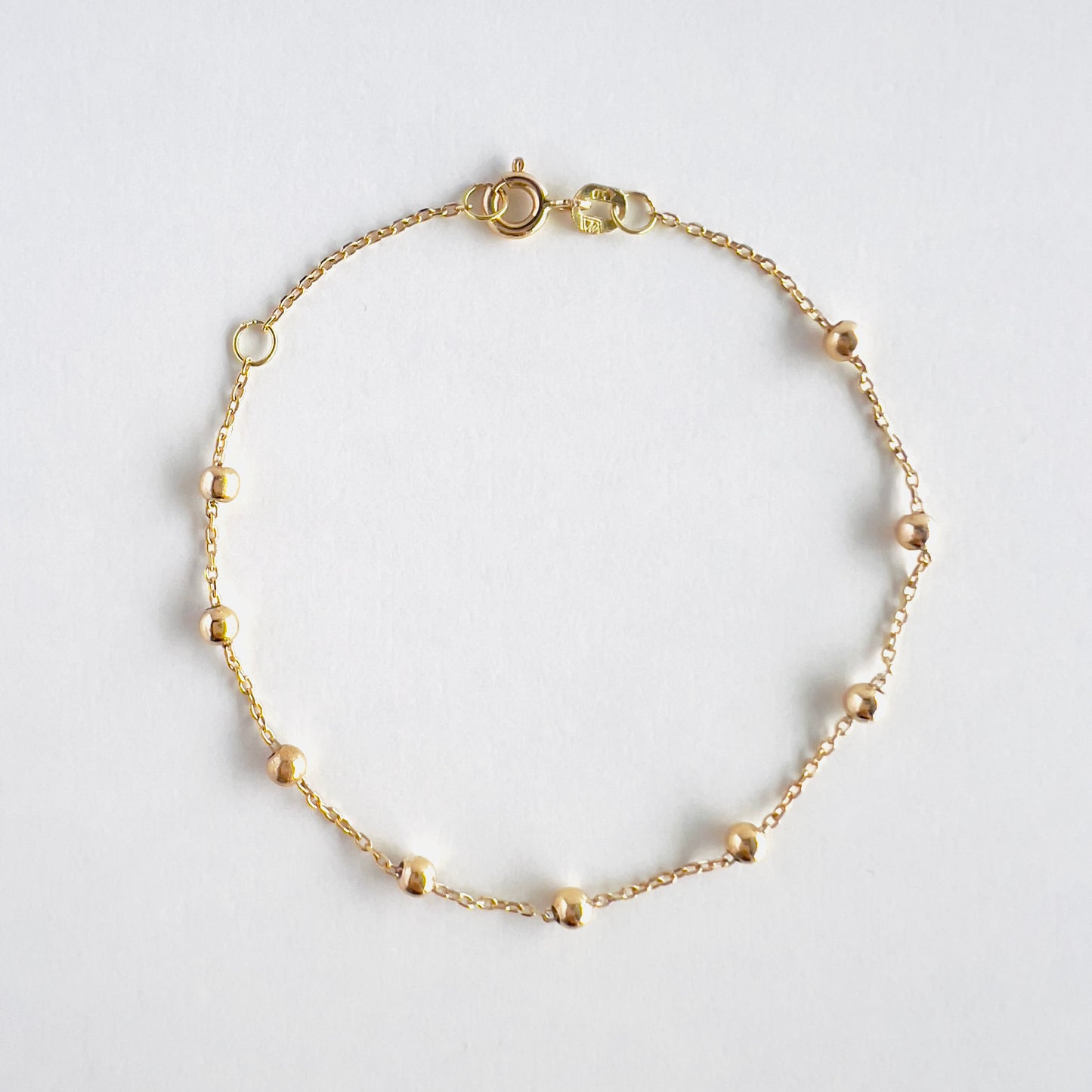 18k gold beaded bracelet in cable style chain