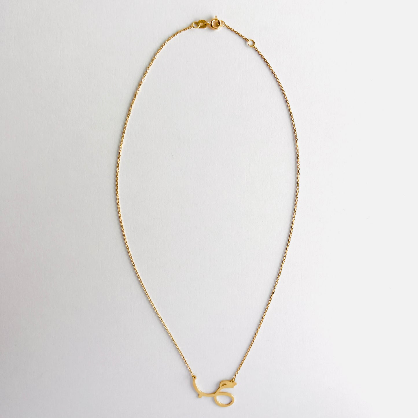 Habiba Necklace featuring elegant Arabic script design symbolizing the word "love" beautifully.