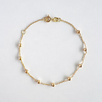 18k gold beaded bracelet in cable style chain