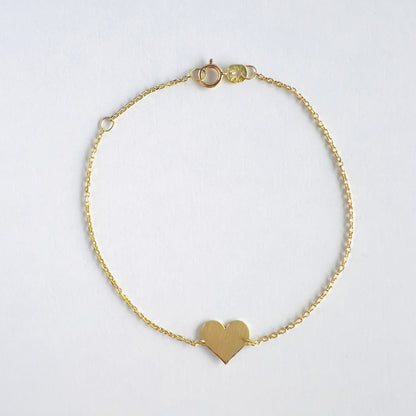 Jamila 18k gold heart charm bracelet